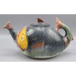 A majolica teapot in the form of a fish, height 16cm, width 28cm.