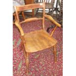 A Victorian elm and fruitwood bar back Windsor armchair,