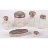 An Edwardian cut glass toilet jar with embossed silver lid, Chester 1908,