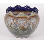 A Royal Doulton stoneware jardinere, the lustre glaze decorated with stylised flowers, No.