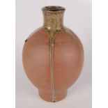 A Paul Stubbs studio pottery vase, the terracotta body part glazed, height 23cm.