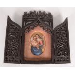 A painted porcelain oval plaque of a woman and child,