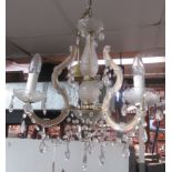 A glass three branch hanging chandelier, height 50cm.