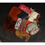 A brown crepe fringed scarf, 175 x 42cm, two silk scarves, four other scarves,