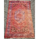 A Hamadan rug, North West Persia, the large polychrome medallion with flowerheads and guls,