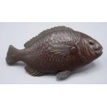 A Japanese bronze model of a carp, 19th century, 5.5 x 10cm.