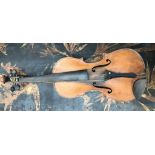 A cased violin, length of back 37.5cm. Condition report: No label.