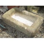 A rectangular granite trough, height 20cm, length 60cm, width 36cm.