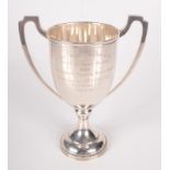A twin handled silver cup to The Fowey Harriers, 7.7oz, maximum height 20cm.