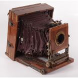 A Victorian mahogany and brass bound folding camera, with label inscribed the 'Special Patent',