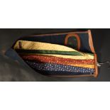 Five silk ties by Salvatore Ferragamo, in a blue canvas and brown leather case, monogrammed A.J.B.