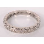 An 18ct white gold and diamond eternity ring.