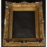 A gilt composition picture frame, 19th century, 67 x 59cm, inner size 43.5 x 34.5cm.
