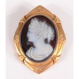 A 19th century classical carved hardstone cameo female portrait in high purity gold brooch mount,