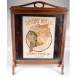 An American WWI food and flour bag, mounted in a mahogany fire screen,