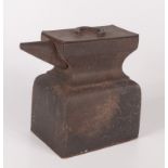 A Macfarlane Lang & Co. biscuit tin in the form of an anvil, height 16cm.