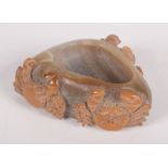 A Chinese agate pot, carved with three crabs, height 3cm, width 7.5cm, depth 6.5cm.