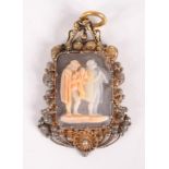 A low purity gold filigree and canatille work pendant set with a cameo carved with itinerant