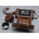 An Ensign Selfix 820 camera, with original leather case, 12 x 17cm.