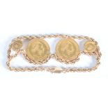 A 14ct gold coin bracelet set with two Austrian gold 4 florin 10 frank coins,
