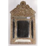 A continental brass wall mirror, 19th century, height 59cm, width 32.5cm.