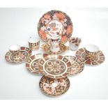 A selection of Royal Crown Derby porcelain, including a plate, diameter 22cm, a cream jug,
