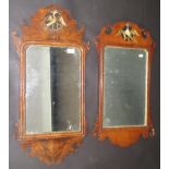 A George III walnut wall mirror, with a gilt decorated stylised bird, above a rectangular plate,