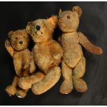 Three love worn teddy bears, one with 'growler', heights 42cm, 44.5cm and 49cm.