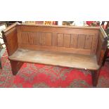 A pitch pine church pew, height 86cm, width 147cm, depth 54cm.