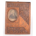 A Victorian carved oak photograph frame, with John Wesley engraving,