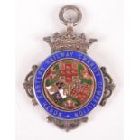 An enamelled silver railway fob for the North Eastern Railway Charity Competition,