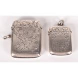 Two Edwardian engraved silver vesta cases.