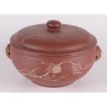 A Yixing pottery bowl and cover, decorated with flowering branches, a bird and script, height 15cm,