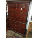 A George III mahogany chest on chest, the dentil cornice above two short and three long drawers,