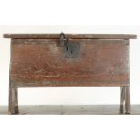 A 17th century oak boarded small chest with notched and moulded decoration.