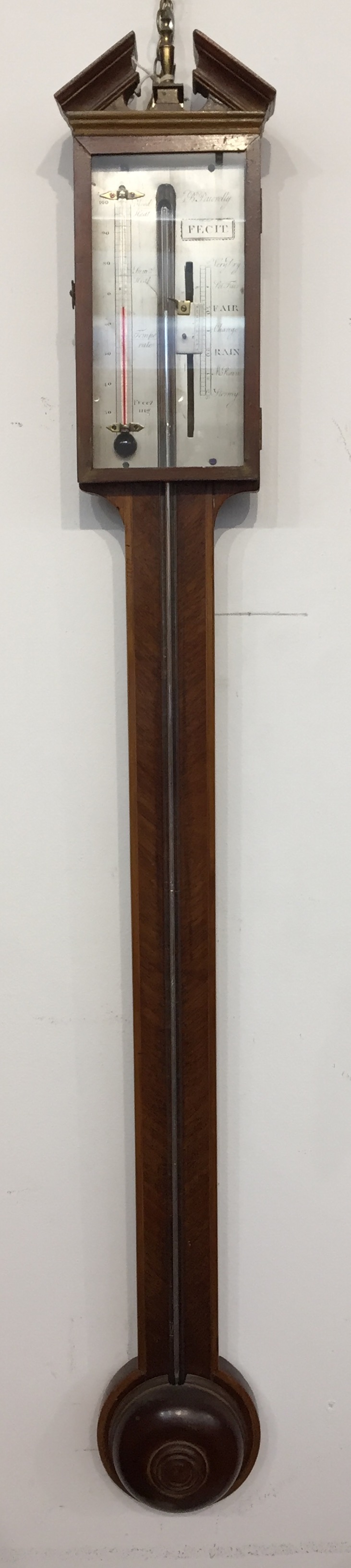 A George III mahogany stick barometer, the silvered dial signed B.Penerelly, height 96cm.