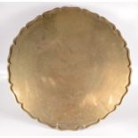A Chinese polished bronze circular wall plaque,