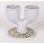 A Troika pale blue double egg cup, signed initials for Alison Brigden,