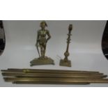 A Victorian brass doorstop, modelled as Napoleon standing on a stepped base on paw feet, height 38.