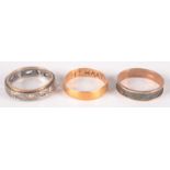 A high purity gold ring inscribed 'Thy Hart's Delight', together with two other gold rings.