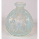 A French iridescent multi faceted glass vase, indistinctly signed, height 9cm, width 8cm.