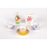 Two Royal Worcester cabinet cups and saucers, decorated with grapes, height of cups 4.