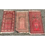 Three Afghan prayer rugs, each with stylised plants and mihrabs, 118 x 66cm,