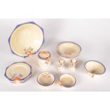 Seventeen pieces of Clarice Cliff Bizarre 'Honeyglaze' items, comprising an octagonal fruit bowl,