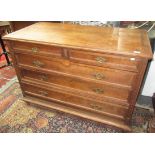 A French oak three piece bedroom suite, comprising an armoire, dressing table and chest of drawers.