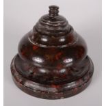 A Cornish serpentine inkwell, with cover and glass liner, height 13cm, diameter 15.3cm.