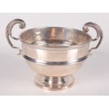A silver footed twin handle bowl, 5.7oz.