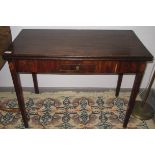 A George III mahogany tea table, with a small central frieze drawer flanked by patera inlay,