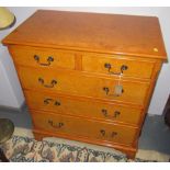 A Georgian III style burr satinwood chest of drawers,