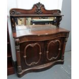 A Victorian rosewood serpentine chiffonier,